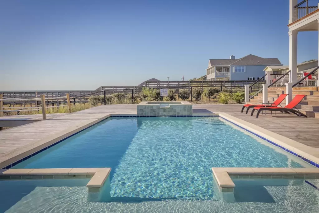 Highlight features that match the season—outdoor kitchens, pools, patios, and shade.