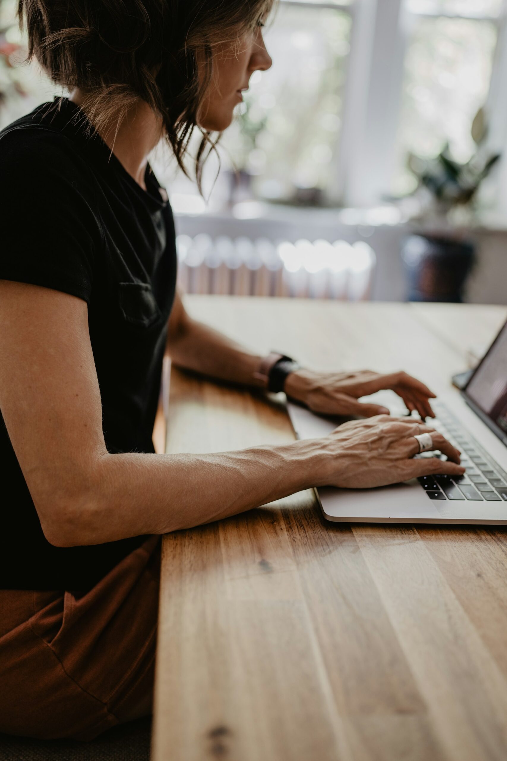 woman on laptop working - Ollin Reach